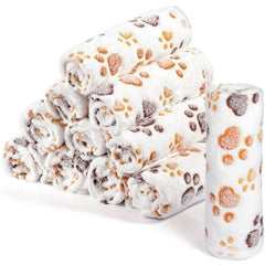 Tegeme paw-print blanket provides cozy warmth for small pets.