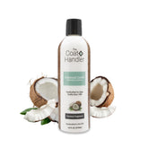 The Coat Handler Undercoat Control bottle pour demonstrates easy dilution for customizable grooming results