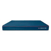 The Dog's Beds blue outer cover with UK flag piping protects joints and keeps the bed tidy.