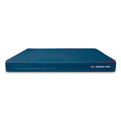 The Dog's Beds blue outer cover with UK flag piping protects joints and keeps the bed tidy.