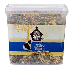 Tiny Friends Farm Gerty Guinea Pig Tasty Mix ingredients close-up with flaked peas and maize for palatable nutrition.