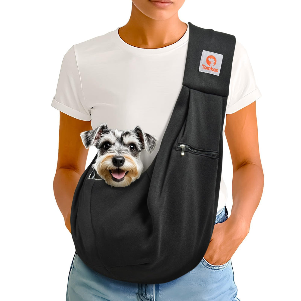 Tomkas dog sling carrier front opening for easy pet entry and secure, hands-free carry.