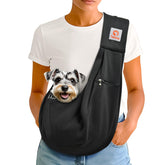 Tomkas dog sling carrier front opening for easy pet entry and secure, hands-free carry.