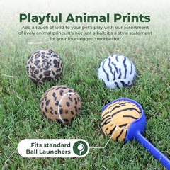 Tourna animal-prints ball in action promotes interactive fetch and stylish play.