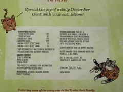 Trader Joe's Cat Advent Calendar cat sniffing calendar doors suggests daily surprise and interactive feeding ritual.