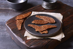 True Chews Premium Jerky Cuts no artificial flavors close-up promoting clean, flavorful dog snacks.