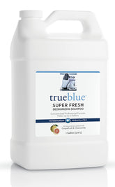 TrueBlue Grapefruit & Chamomile shampoo bottle pour demonstrates tearless cleansing.