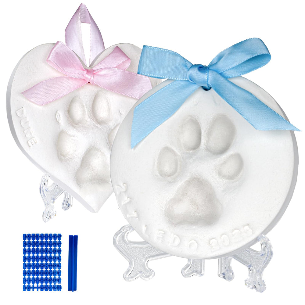 Two crisp paw prints from the Tubuui dog paw print kit ready for wall display.