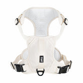 TUG dog harness front clip shown for no-pull training and improved steering.