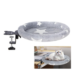 Turbosus cat desk bed glow-in-the-dark astronaut pattern creates cozy night-time vibes.