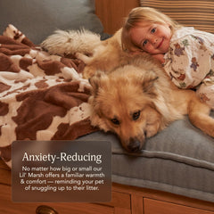 UnHide Lil’ Pet Marsh nap on bed highlights lightweight warmth and snuggle spot.