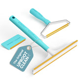 Uproot Clean Mini fur remover handle glides over fabric for quick pet-hair removal.