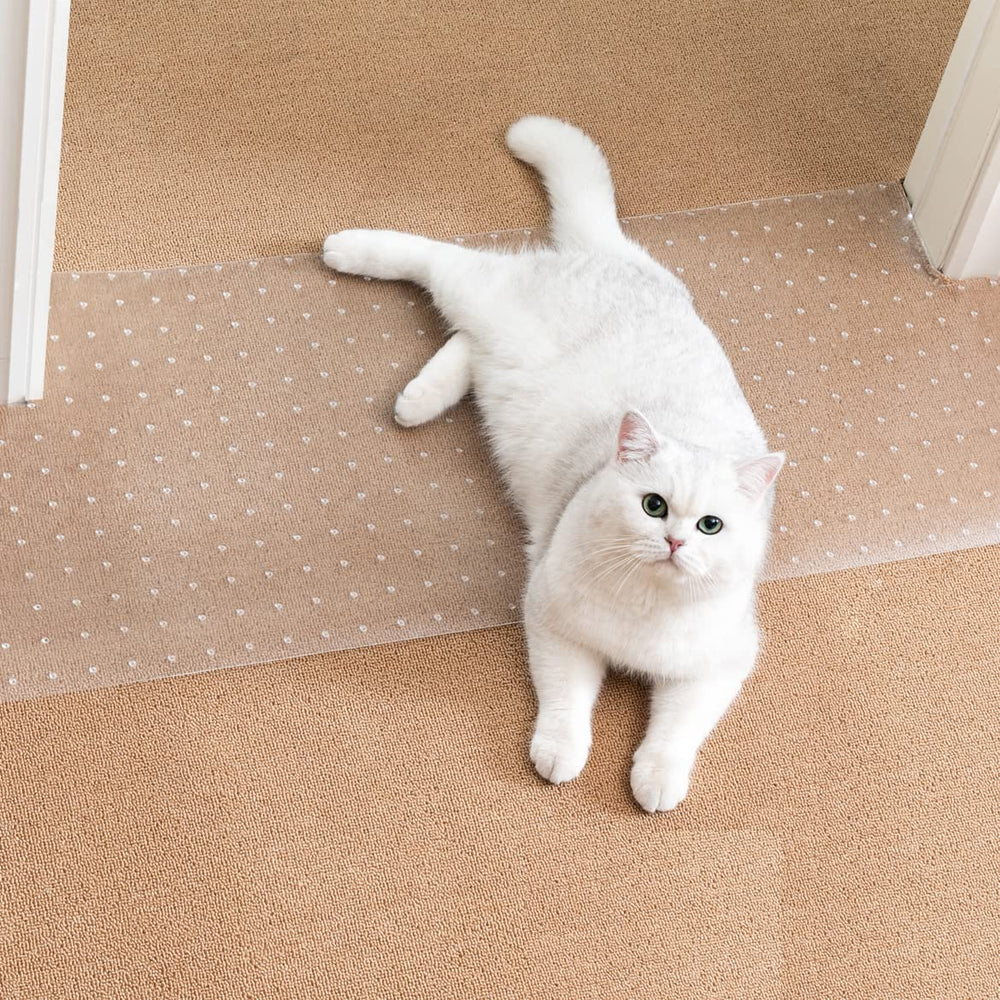 Uross doorway carpet protector with wide guard showing fit for standard doors and pets.