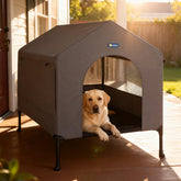 Veehoo 41-inch dog house with elevated bed offering a dry, comfortable perch outdoors.