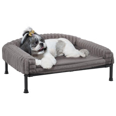Veehoo elevated dog bed front view shows sturdy frame and cozy bolster for small dogs.