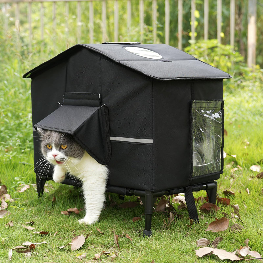 Veehoo Outdoor Cat House elevated bed keeps feral cats dry and warm.