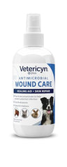 Vetericyn Plus wound spray applied on a dog's paw for quick cleaning and relief.