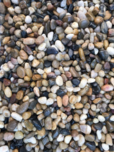 Voulosimi river rock stones mixed colors polished for decorative arrangements and natural texture.