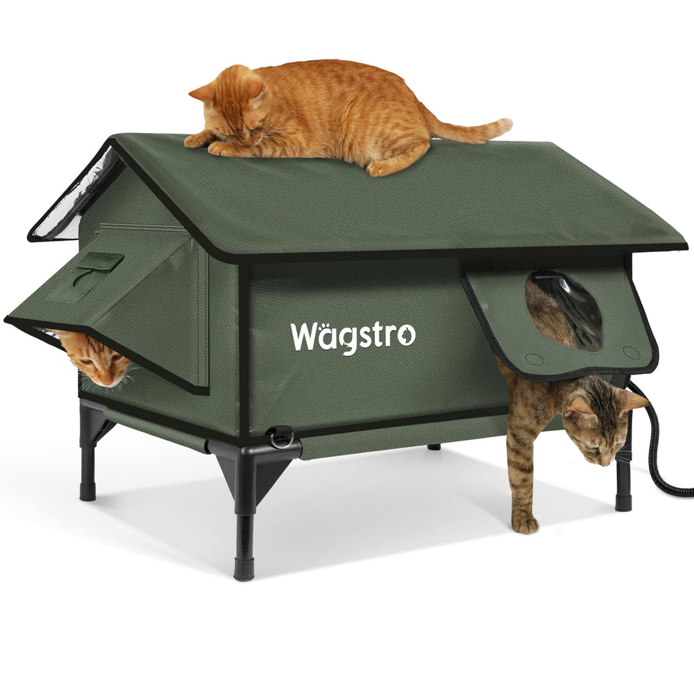 Wagstro Gable heated cat shelter outdoors in olive green; keeps feral cats warm outdoors.