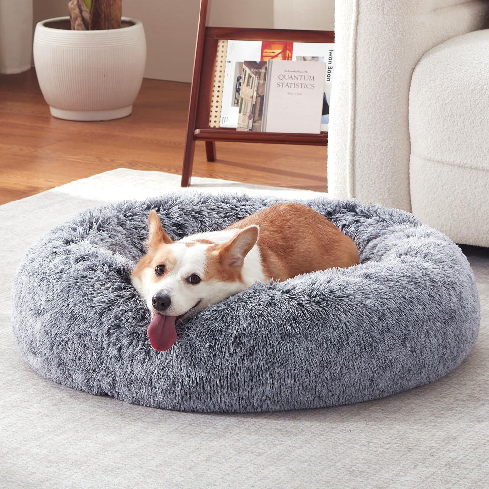Warmrest donut dog bed outer view shows round grey design with cozy support