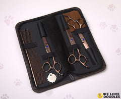 We Love Doodles dog comb for detangling and smoothing coat during grooming.