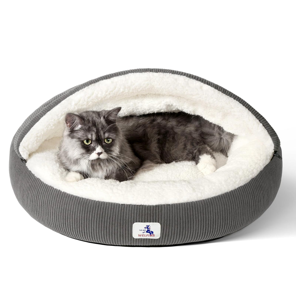 Welfibr covered cat bed in gray creates a snug cave for privacy and warmth.