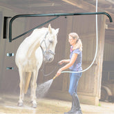 WGOHOSE swinging-arm horse wash attachment keeps the hose elevated for easier, tangle-free rinsing.