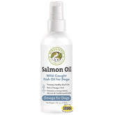 Wholistic Pet Organics salmon oil bottle label emphasizes wild Alaskan origin for omega support.