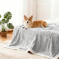 WowOhPet blanket close-up shows waterproof lining protecting furniture from spills