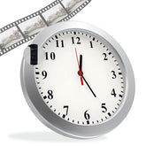 XCOUI hidden camera clock front view shows discreet 1080p security on wall