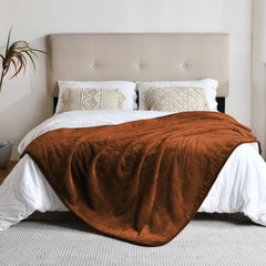 Yaning double-sided sherpa-flannel blanket offers plush warmth and dual textures.