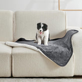 Yaning waterproof blanket on bed and couch protects furniture from spills and fur.