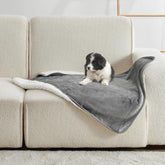 Yaning waterproof blanket on bed protects from spills and pet hair.