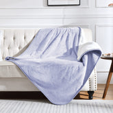 Yaning waterproof blanket on bed protecting from spills and pet accidents.