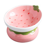 Yeexoxow ceramic raised cat bowl in pink with stable design for spill-free feeding.