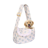 YHSHYZH Floral Dog Carrier blue daisy strap, showing hands-free wear for a small pet