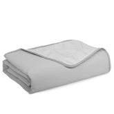 ZAKAPAWS cooling blanket on a sofa with a dog for cooling comfort