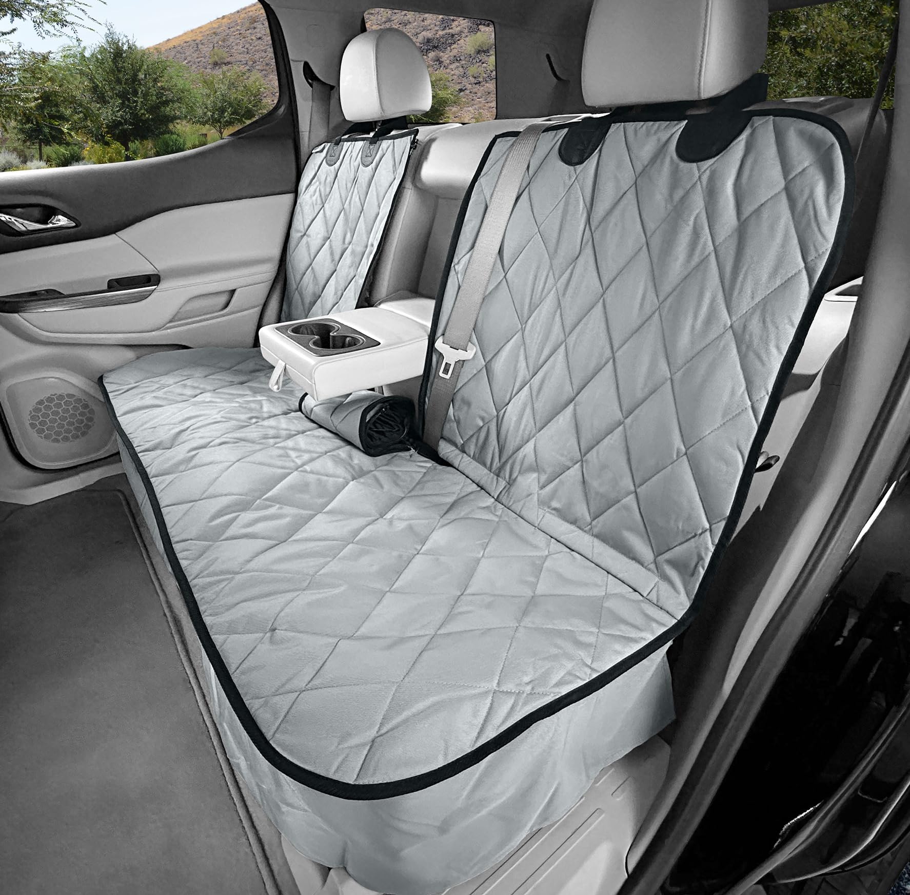 4Knines dog seat cover on backseat demonstrates 60-40 split compatibility and protection.