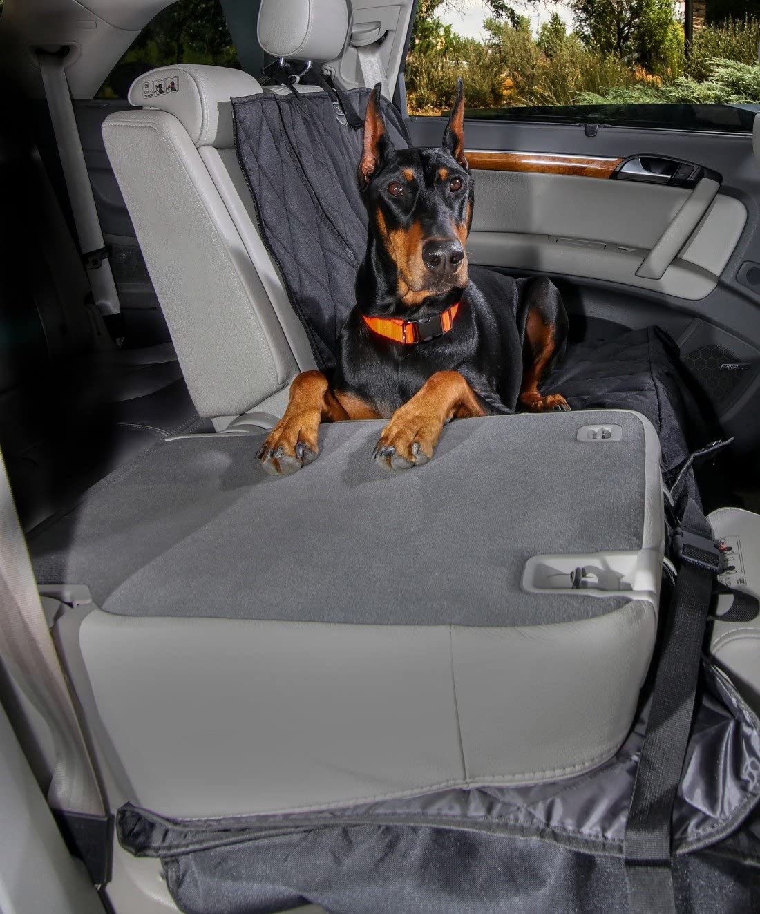 4Knines dog seat cover quick-release clips for fast removal and cleaning.