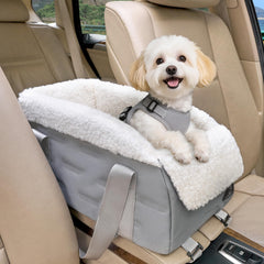 A 4 Pet center-console seat close-up showing double-safety buckles for small dogs.