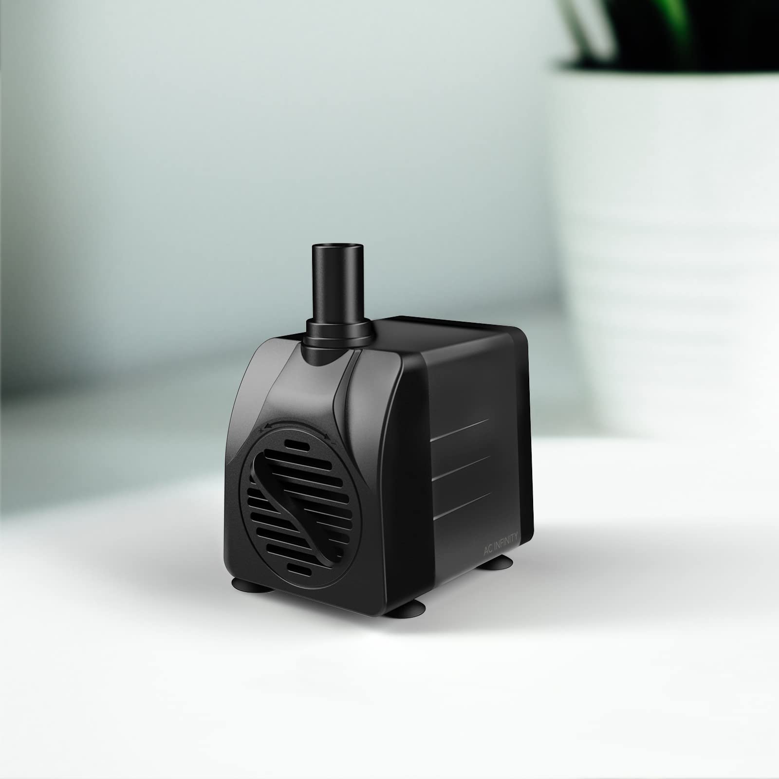 AC Infinity submersible water pump in a pond setup suitable for ponds and pools.