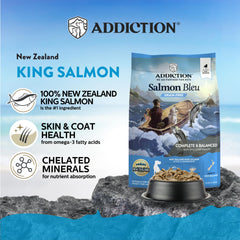 Addiction Salmon Bleu kibble close-up reveals grain-free formula and bite-sized pieces.