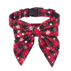 ADOGGYGO Christmas dog collar bow closeup highlights festive plaid for adorable holiday photos.