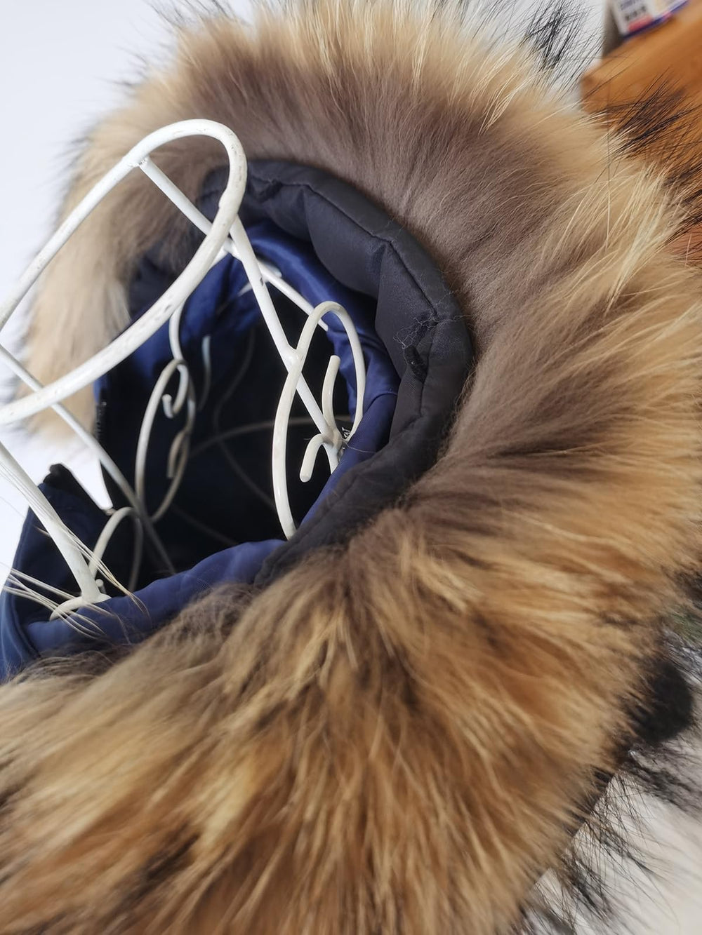 Adynice raccoon hairs durable natural look on apparel.