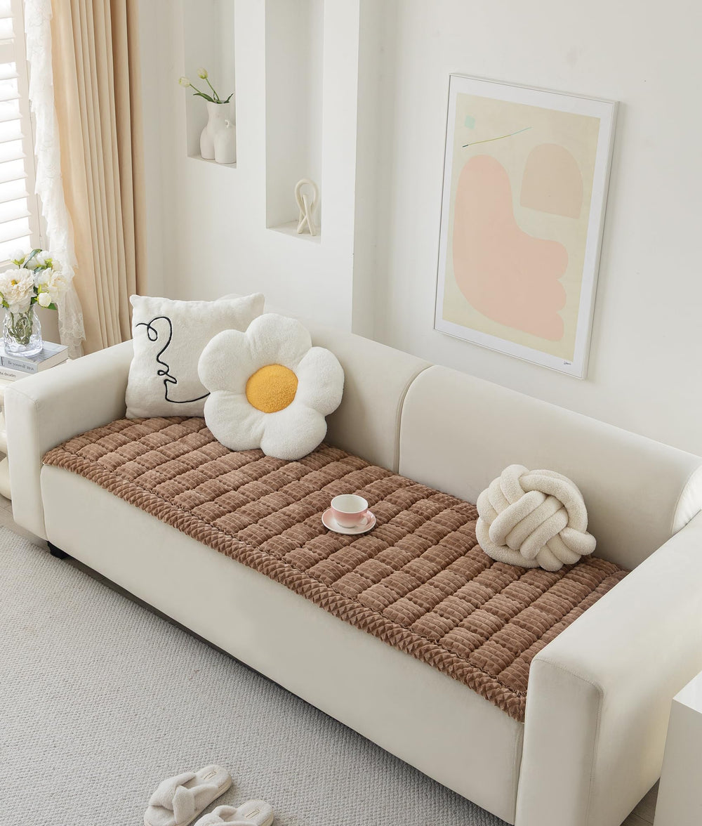 AEEISHOMEREFORM couch cover with non-slip dots keeping the sofa steady during play