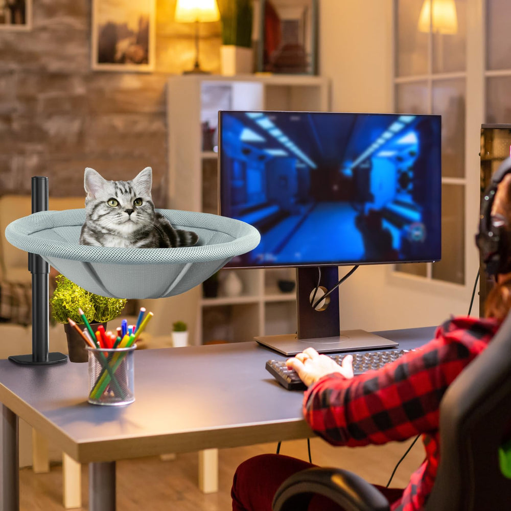 AIPERRO Cat Desk Bed in use with a cat beside a busy workstation