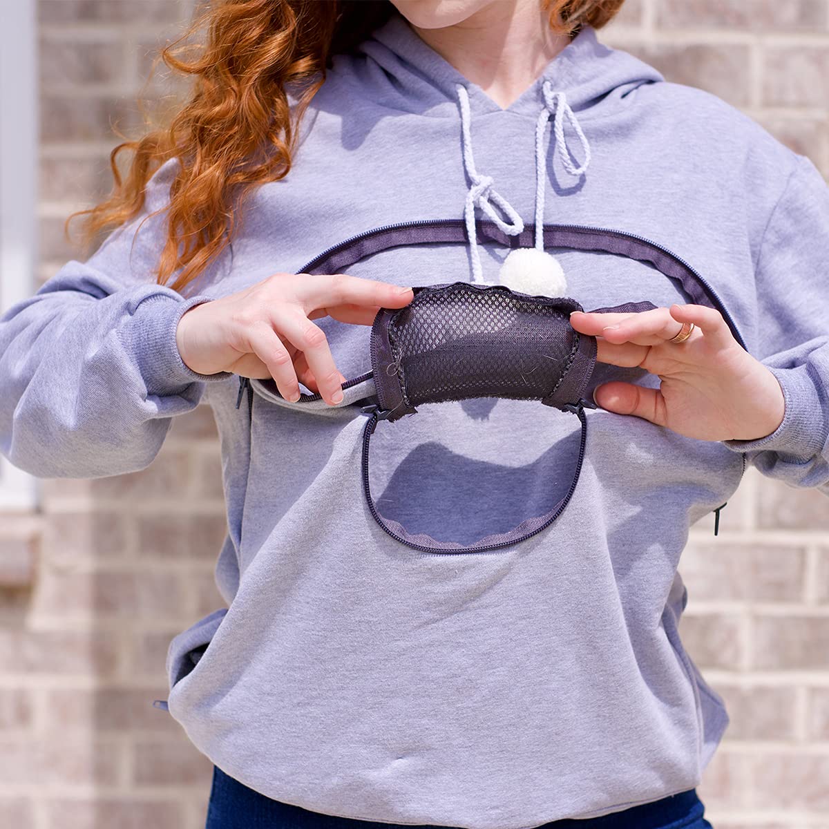 ALYC Pet Carrier Hoodie cat ears add playful style during outings.