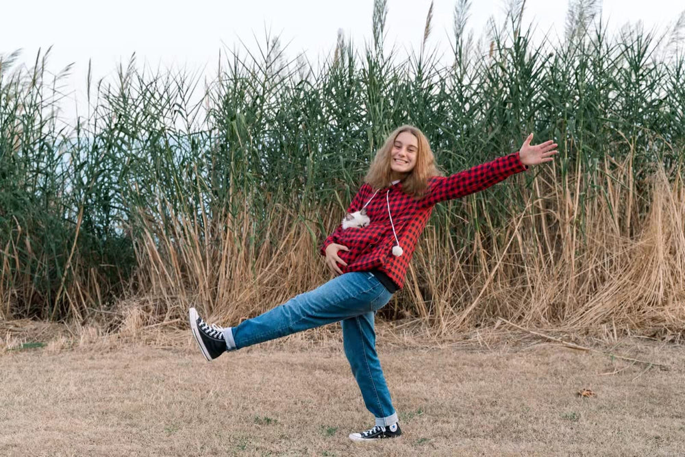 ALYC Pet Pouch Hoodie red-black colorway pairs with casual outfits.