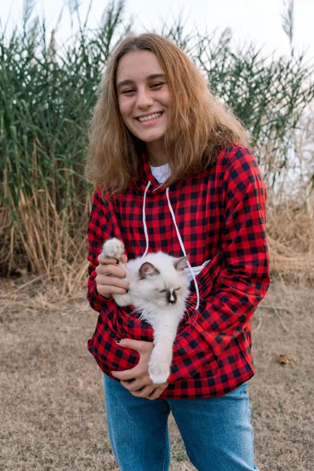 ALYC Pet Pouch Hoodie in-use while walking demonstrates hands-free pet comfort.