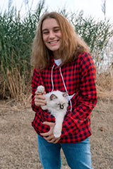 ALYC Pet Pouch Hoodie in-use while walking demonstrates hands-free pet comfort.